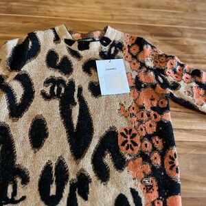 CHANEL Black and Orange Crew Neck Sweaters with Cozy Texture